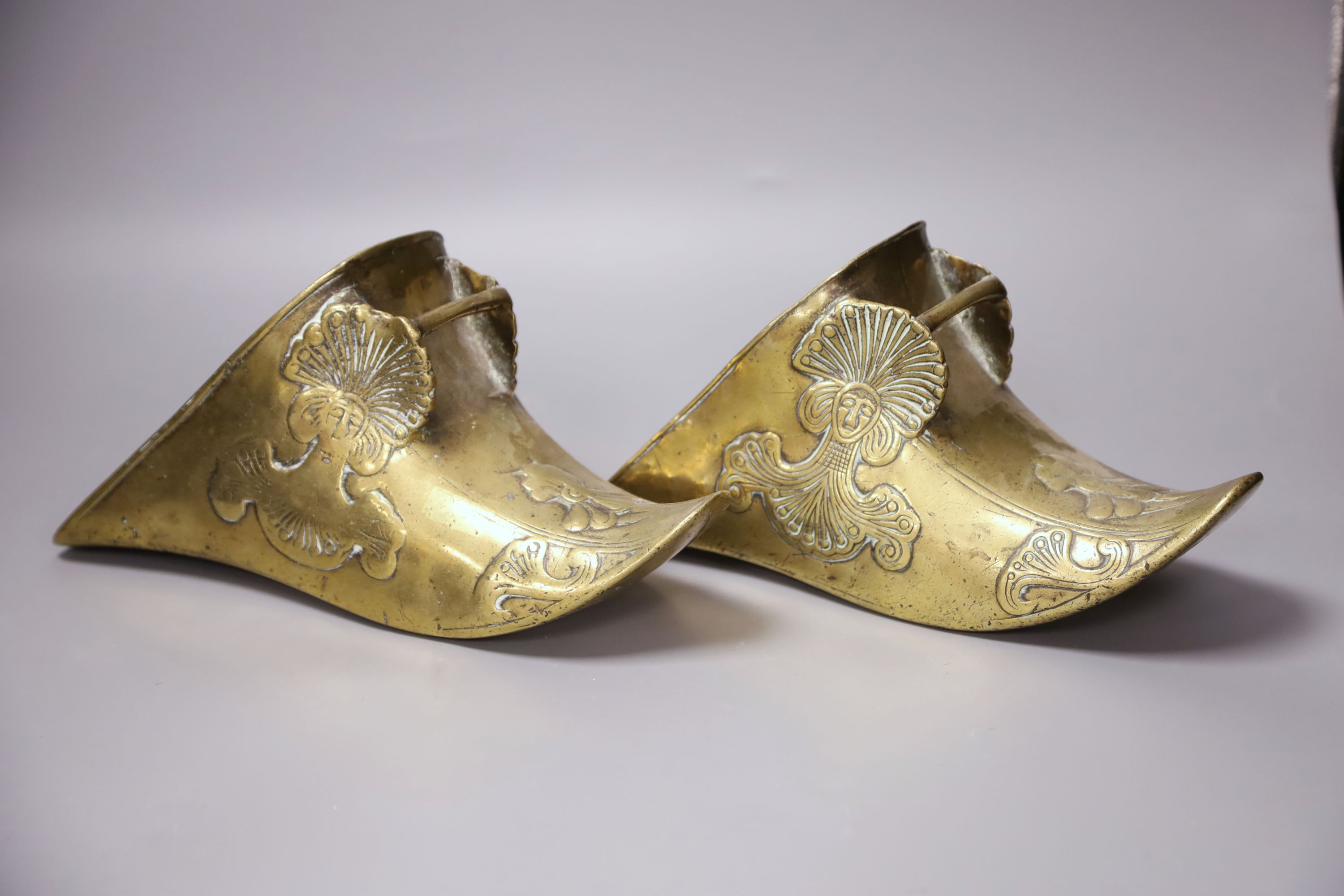 A pair of Spanish colonial brass stirrup shoes, length 26cm